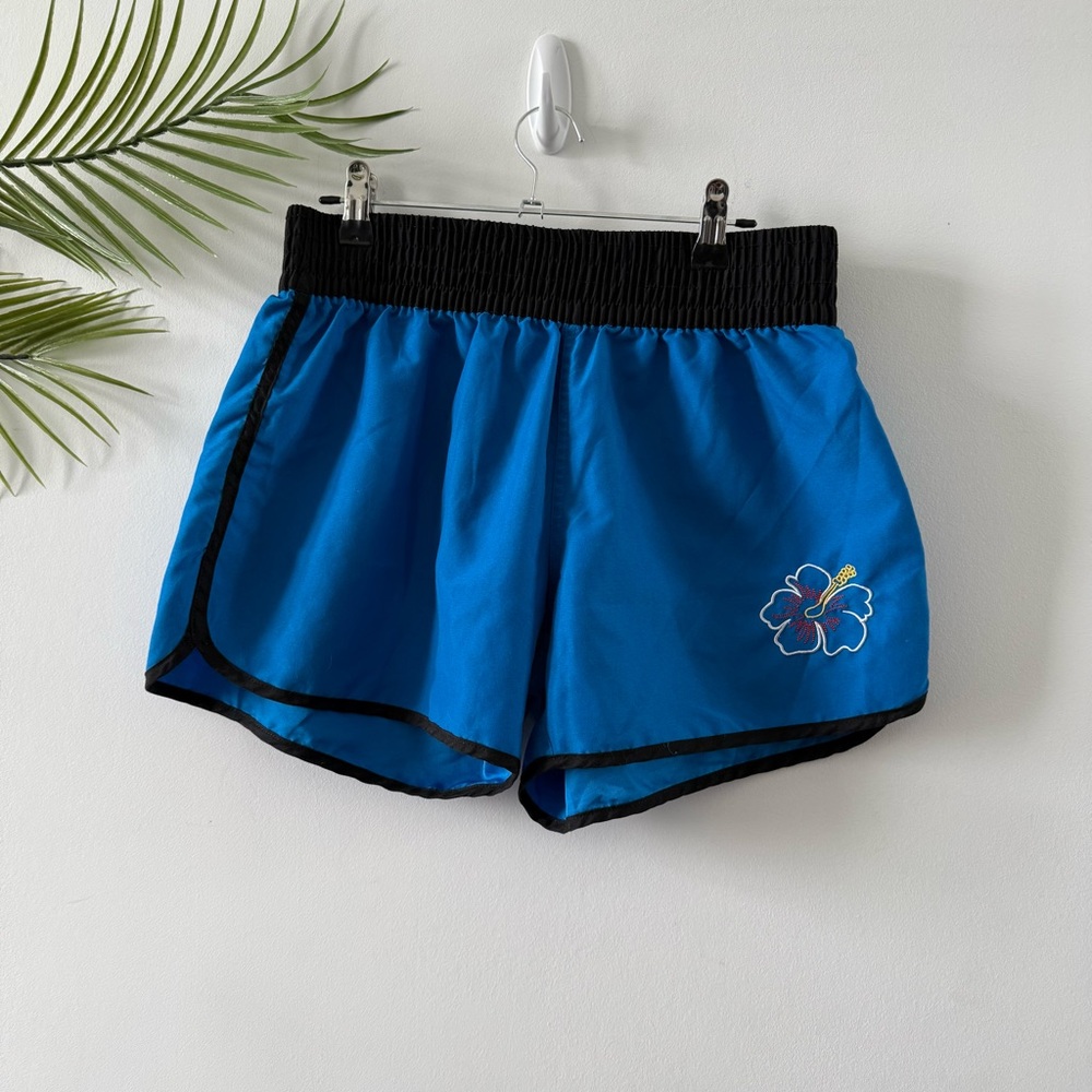 Blue and Black Athletic Shorts with Island Design